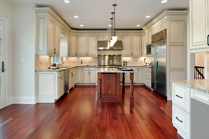 hardwood floor in a kitchen - a blog post about FAQs for hardwood floor refinishing